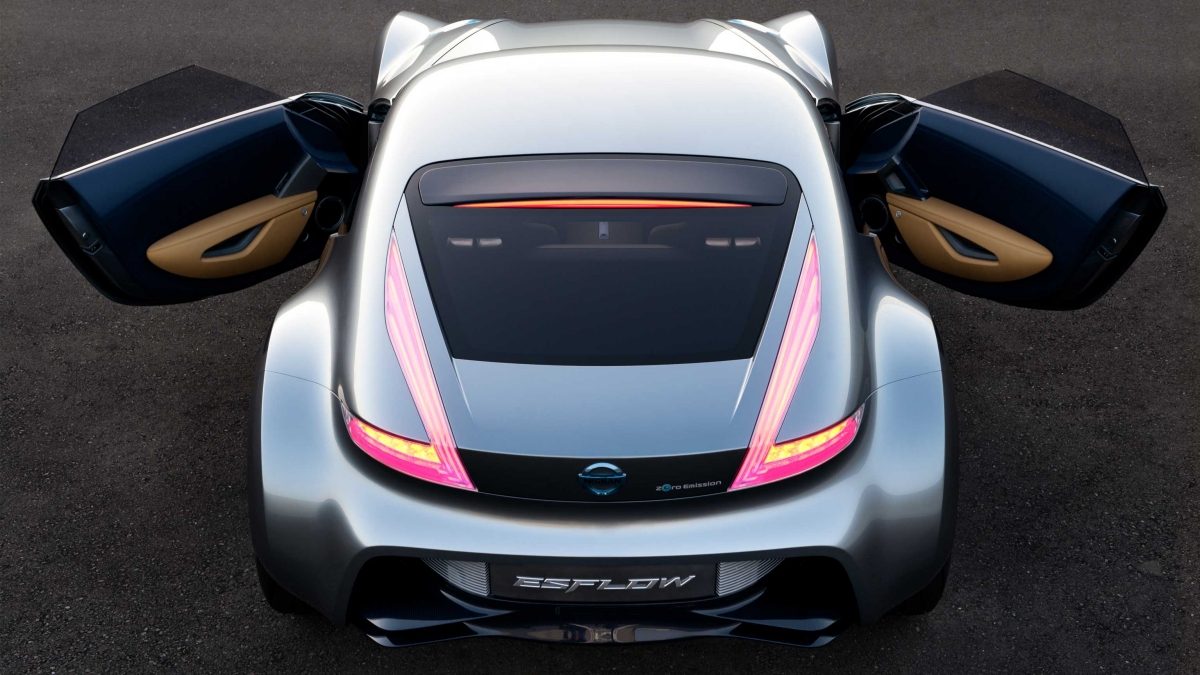 Rear view of the ESFLOW electric sports car concept shown in silver with its doors open and boomerang-shaped taillights