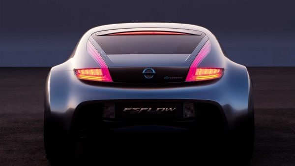 Rear view of the ESFLOW electric sports car concept shown in silver with boomerang-shaped taillights