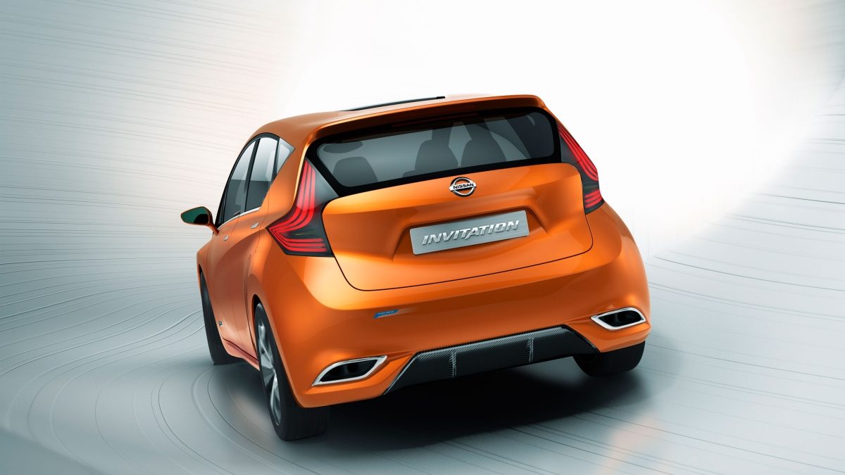 Rear view of a Nissan Invitation shown in a shiny burnt orange color