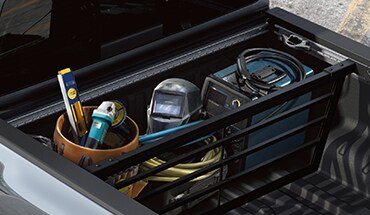 Divisor deslizante para la caja de la Nissan TITAN 2023.