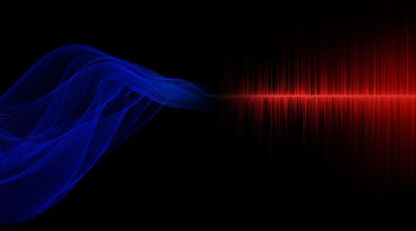 El Nissan Armada 2022 con ondas de sonido en rojo y azul lustrando a Bose Audiopilot.