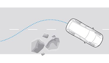 Ilustración del Nissan Armada 2022 esquivando rocas con el sistema de frenado antibloqueo.