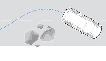 Ilustración del Nissan Armada 2023 esquivando rocas con el sistema de frenado antibloqueo.