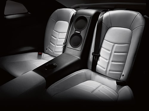 2024 Nissan GT-R rear seating with subwoofer.