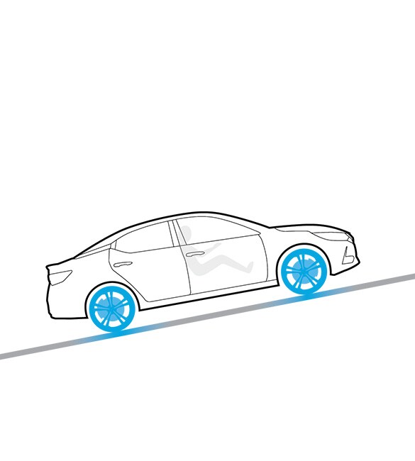 Ilustración del Nissan Versa 2022 en una colina utilizando el asistente de subida y bajada de pendientes
