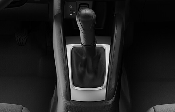 Ilustración de la palanca de cambios del Nissan Versa 2023 con la transmisión manual de 5 velocidades.